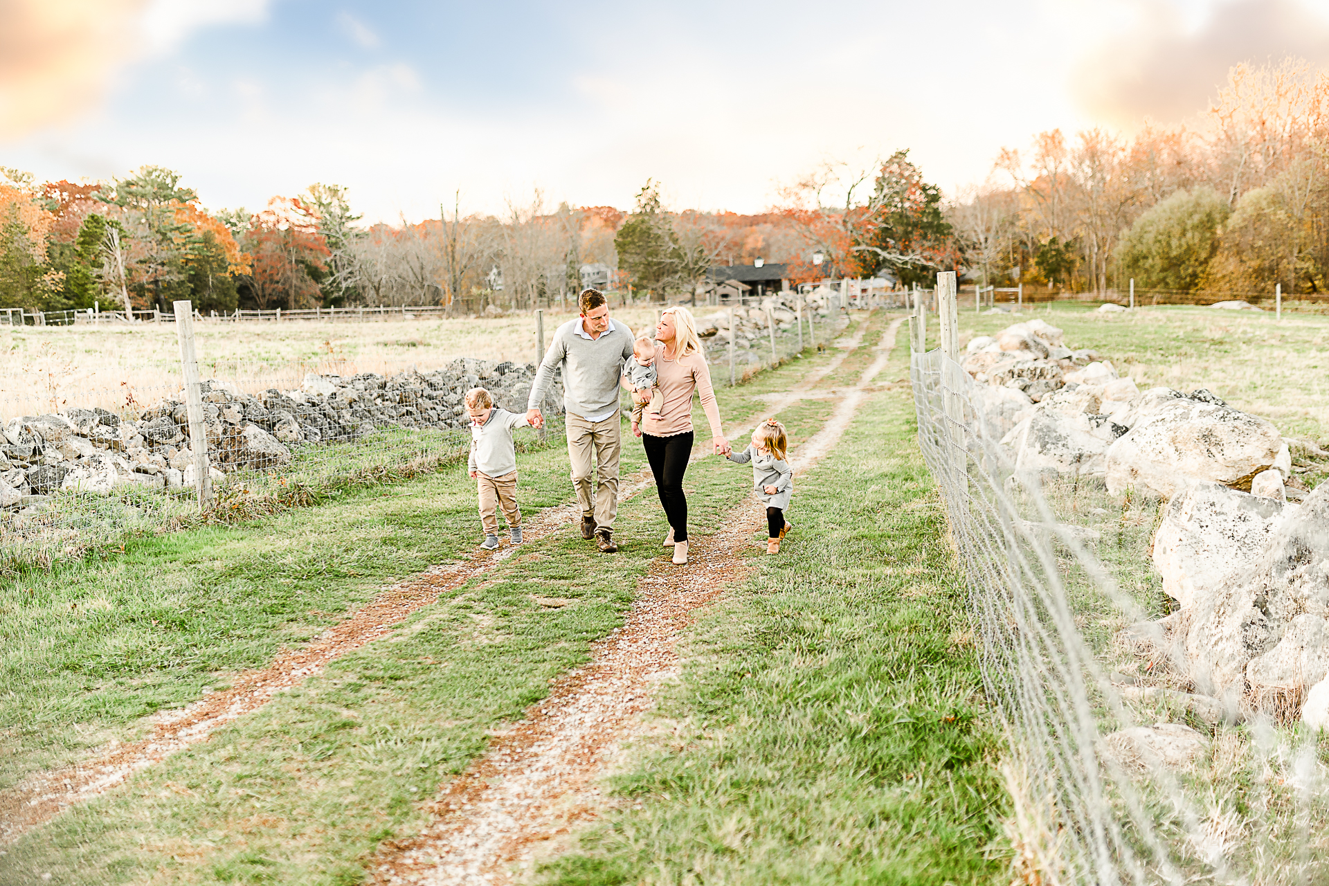 Photo by Norwell Photographer Christina Runnals | Family walking down a farm road