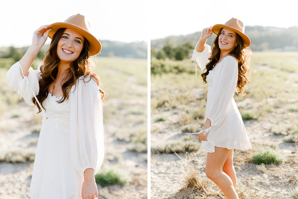 Beach picture by senior photographer Christina Runnals | High school senior girl wearing a hat in a field