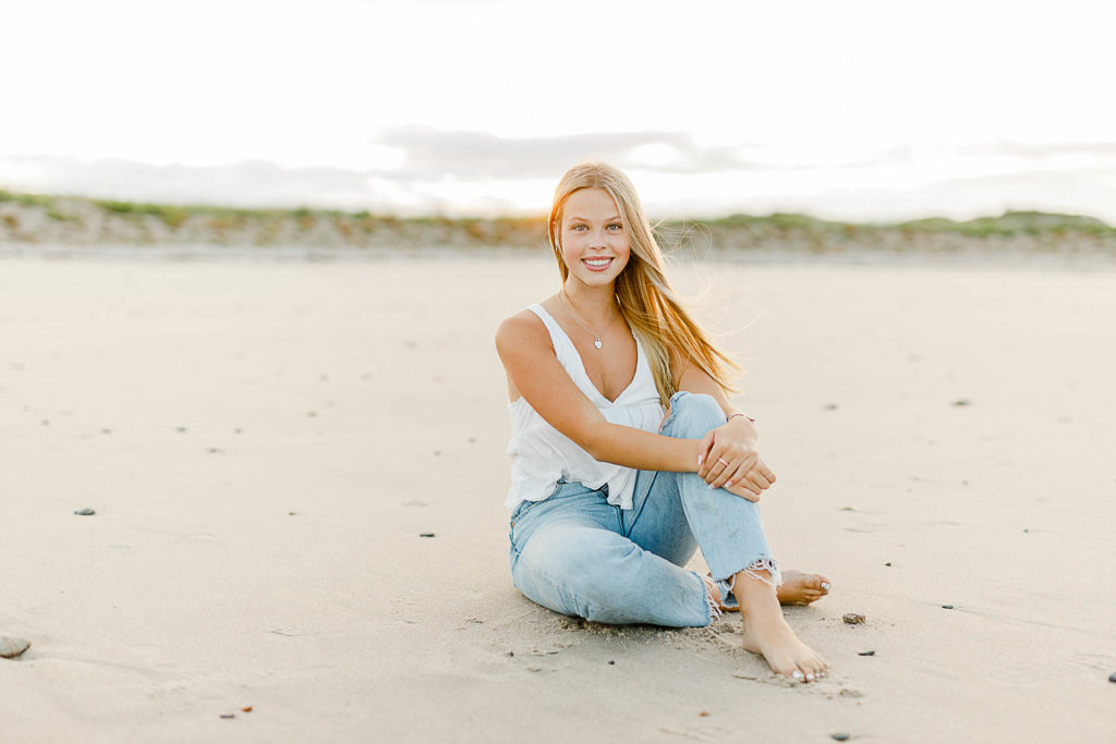Photo by Massachusetts senior portrait photographer Christina Runnals | High school aged girl having beach senior pictures taken