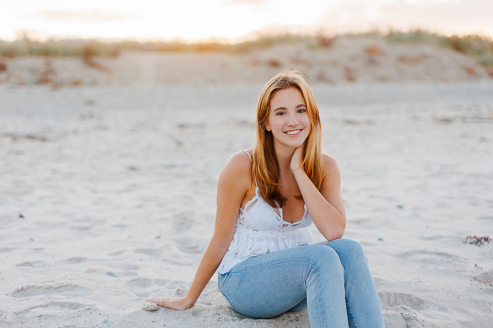 Cohasset Senior Portraits by Christina Runnals Photographer | Girl sitting in the sand at the beach