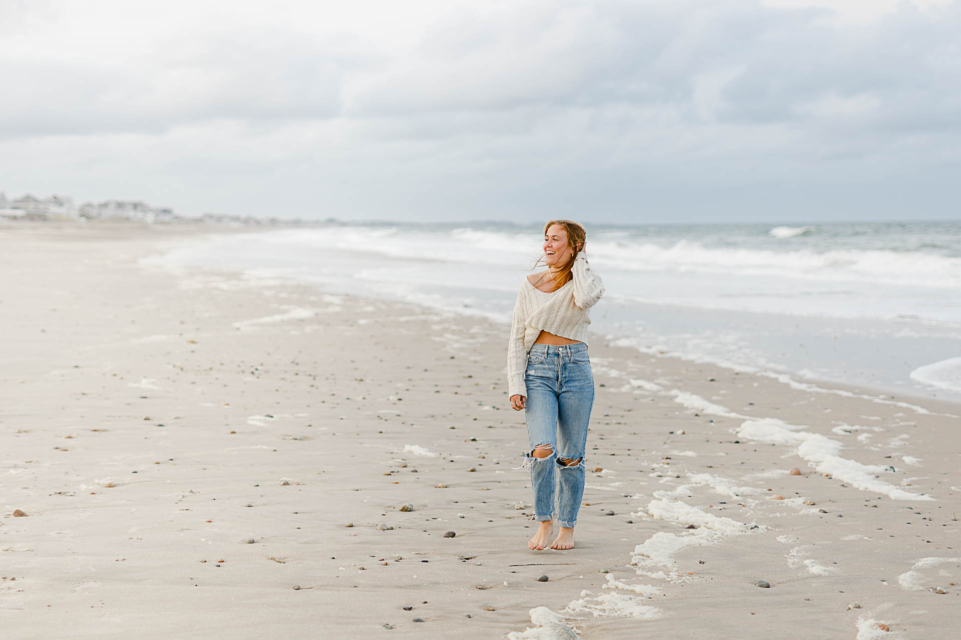 Photo from Caroline's Thayer Academy Senior Pictures by Christina Runnals Photography | High school senior girl walking on the beach 
