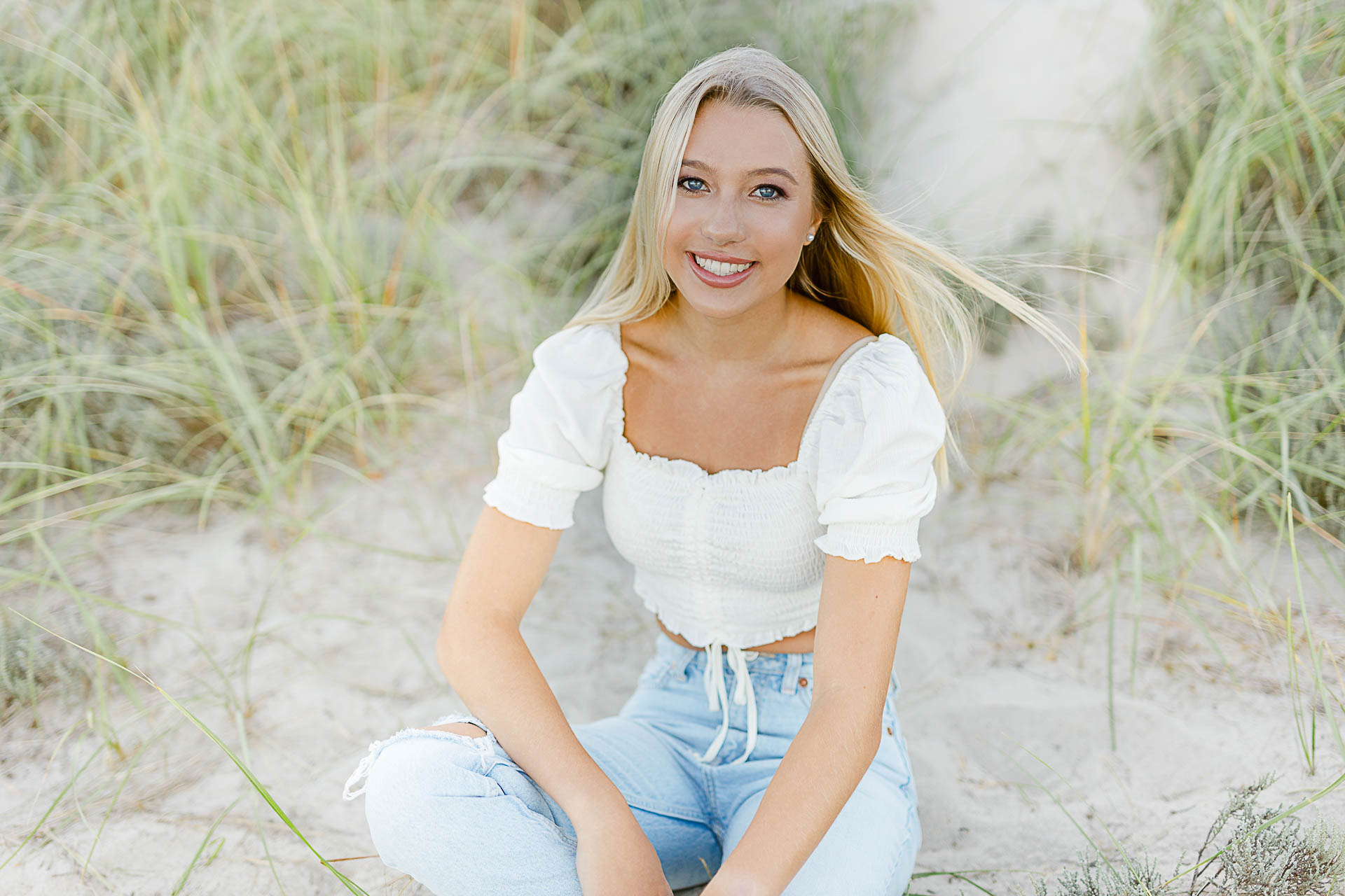 Photo by Scituate Senior Photographer Christina Runnals | High school senior girl sitting in the beach grass