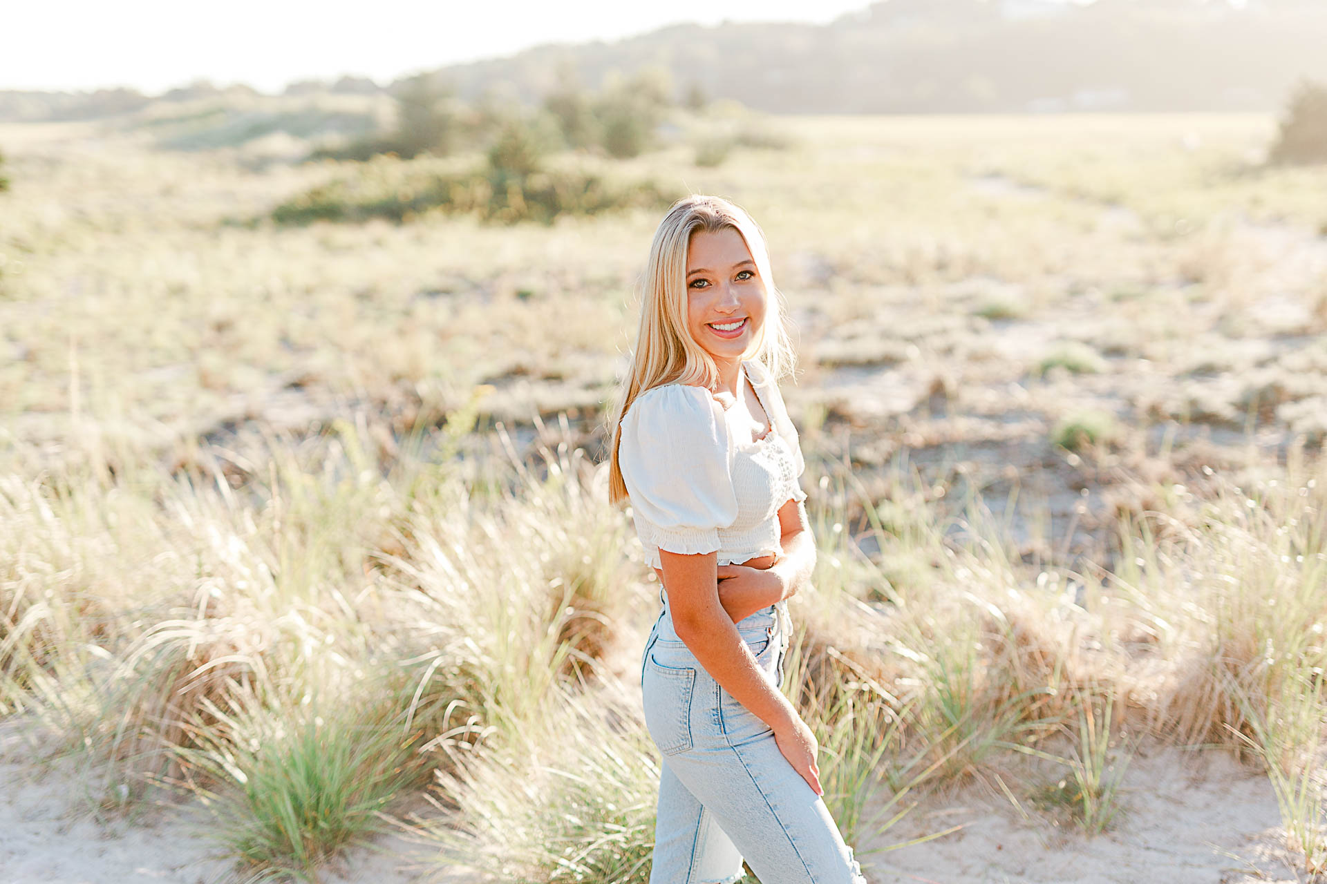Photo by Scituate Senior Photographer Christina Runnals | High school senior girl standing in the beach grass