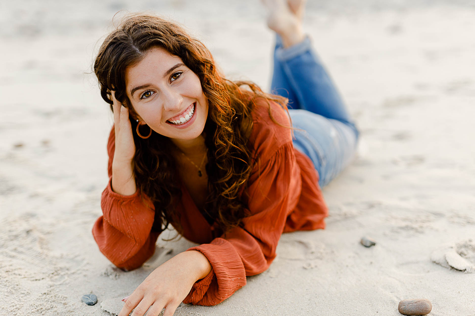 Photo by Hingham Senior Portrait Photographer Christina Runnals | Girl laying on the beach 