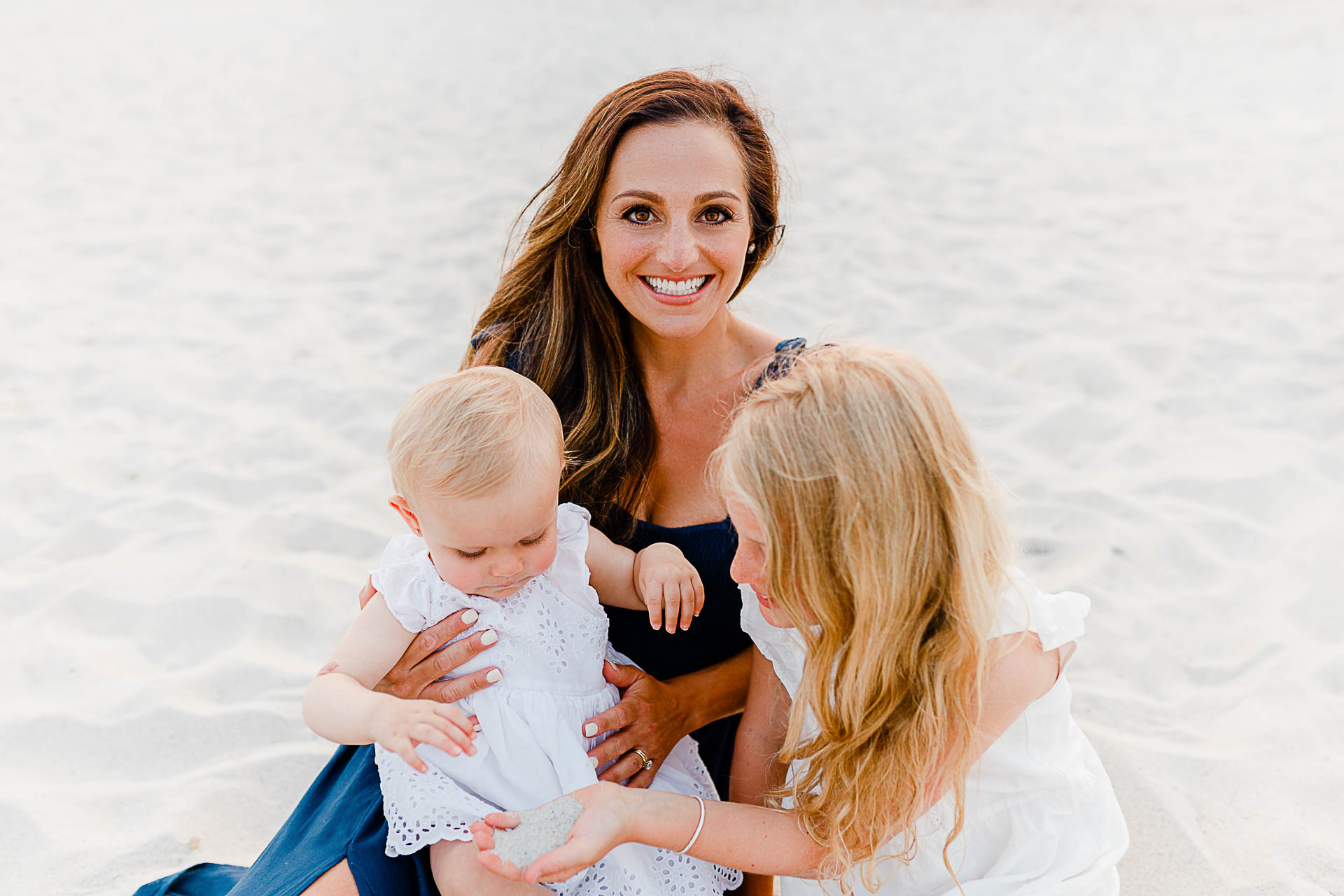 Photo by Cape Cod Family Photographer Christina Runnals | Woman with two daughters on beach