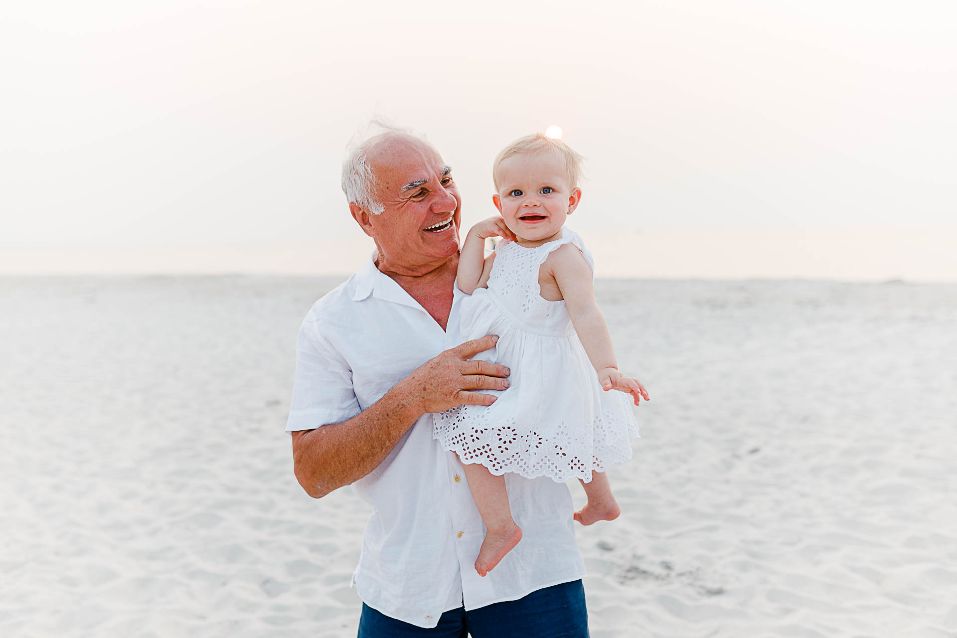 Photo by Cape Cod Family Photographer Christina Runnals | Grandfather with baby girl on beach
