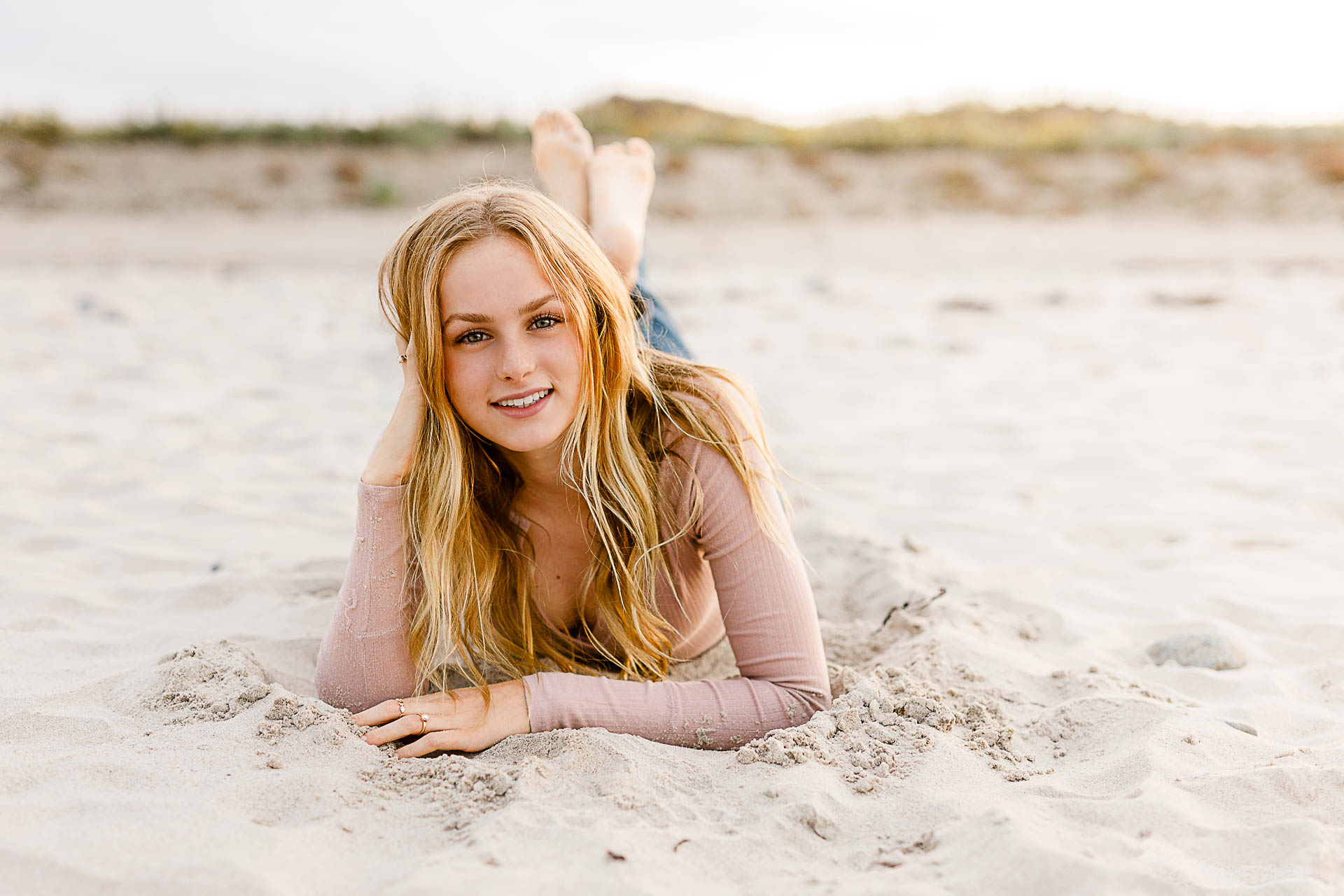 Photo by Scituate Senior Portrait Photographer Christina Runnals | Girl laying in the sand