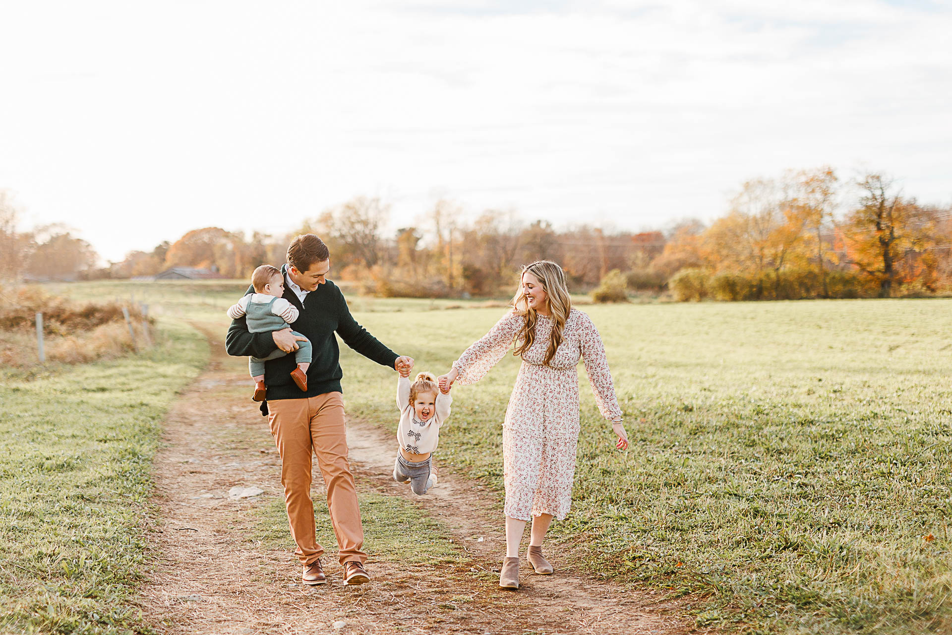 Photo by Hingham Family Photographer Christina Runnals | Family walking in field