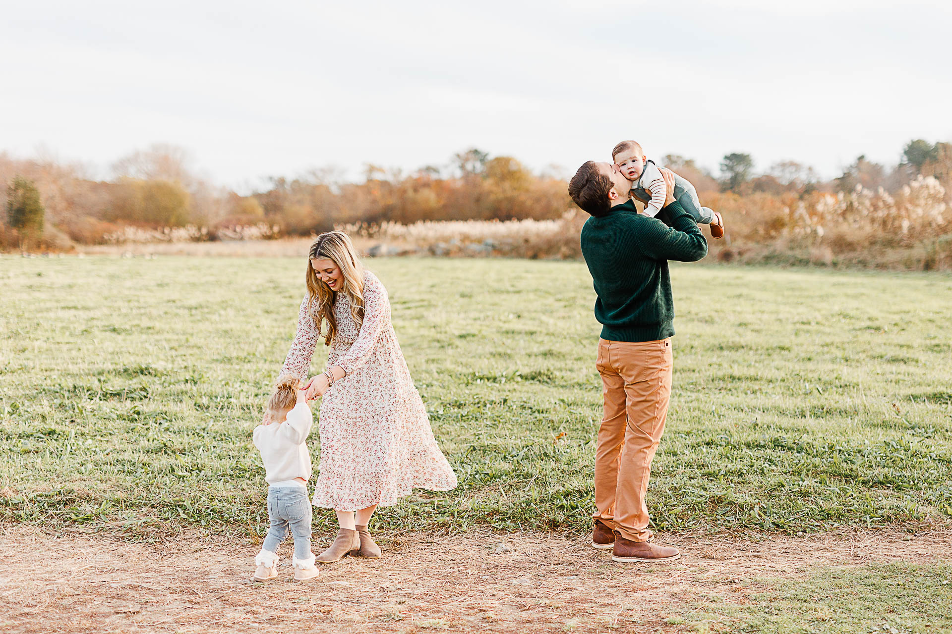 Photo by Hingham Family Photographer Christina Runnals | Family dancing in field
