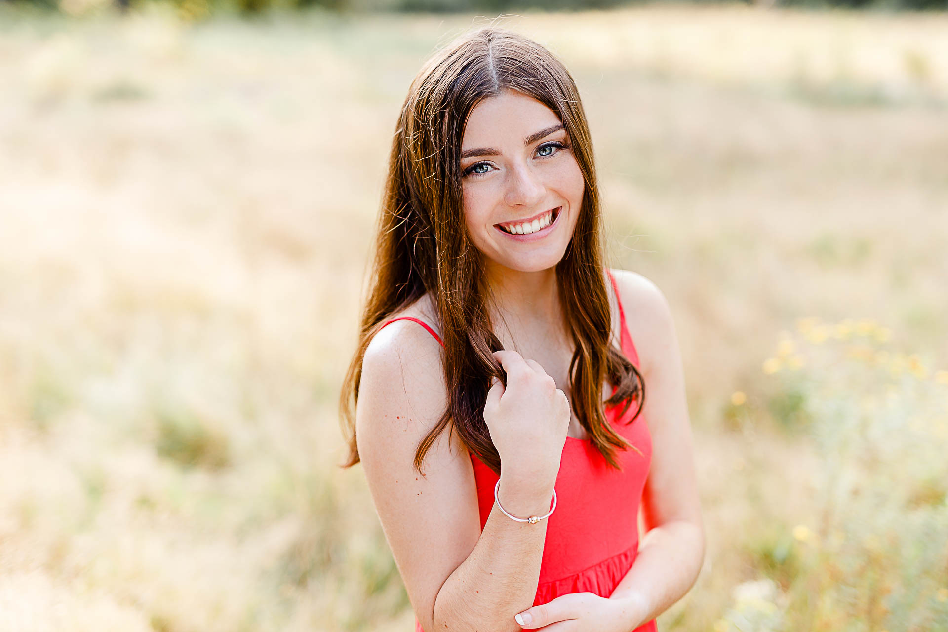 Photo by Duxbury senior portrait photographer Christina Runnals | High school senior girl wearing a red dress