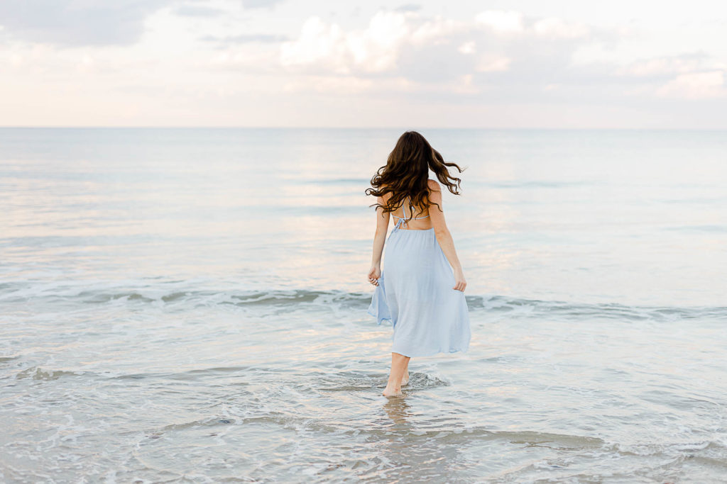 Photo by Scituate Senior Portrait Photographer Christina Runnals | High school senior girl walking into the water
