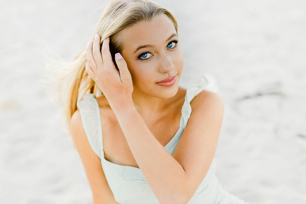 Photo by Scituate Senior Portrait Photographer Christina Runnals | High school senior girl sitting in the sand