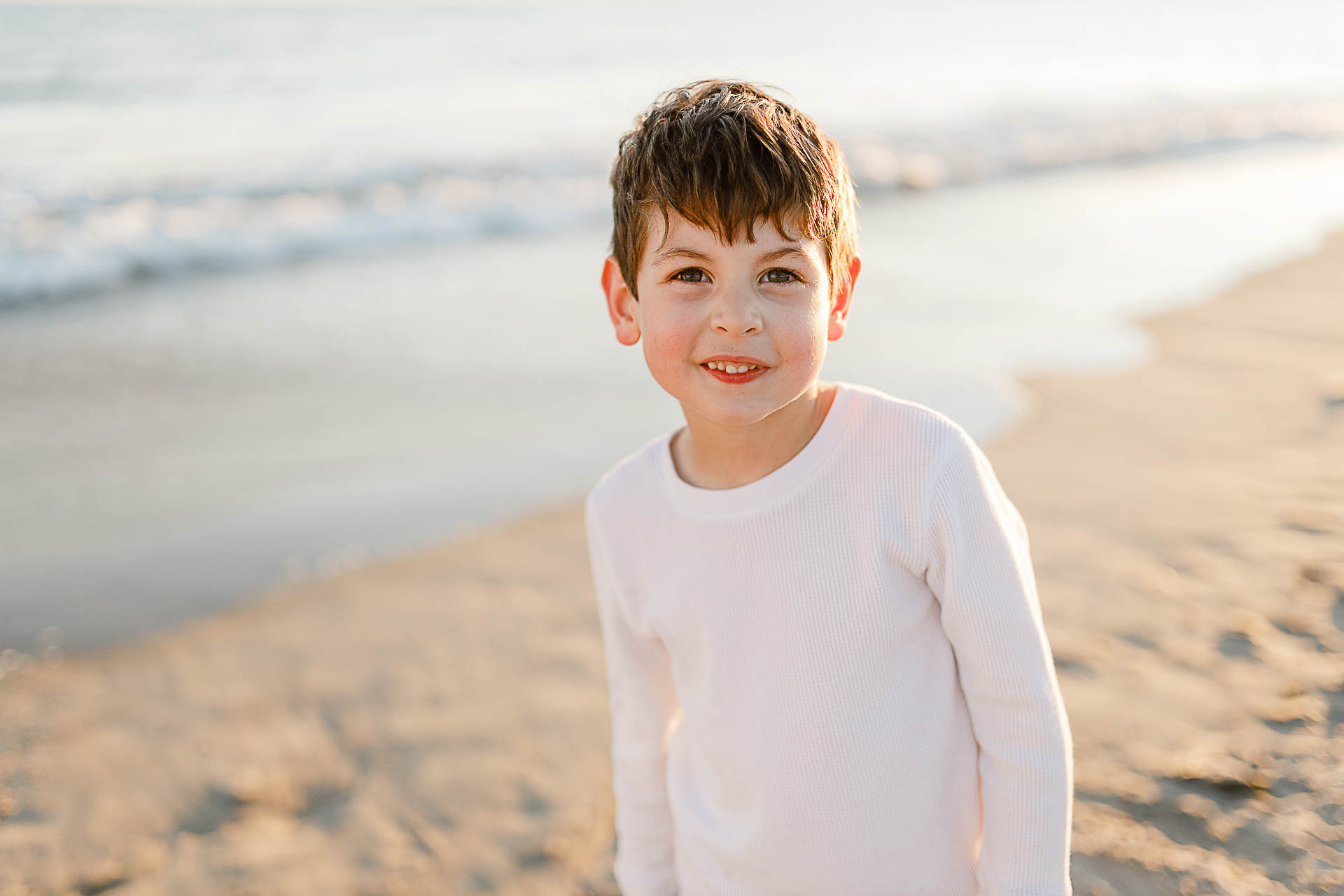Watch Hill Family Portraits by Christina Runnals Photography | Young boy on the beach