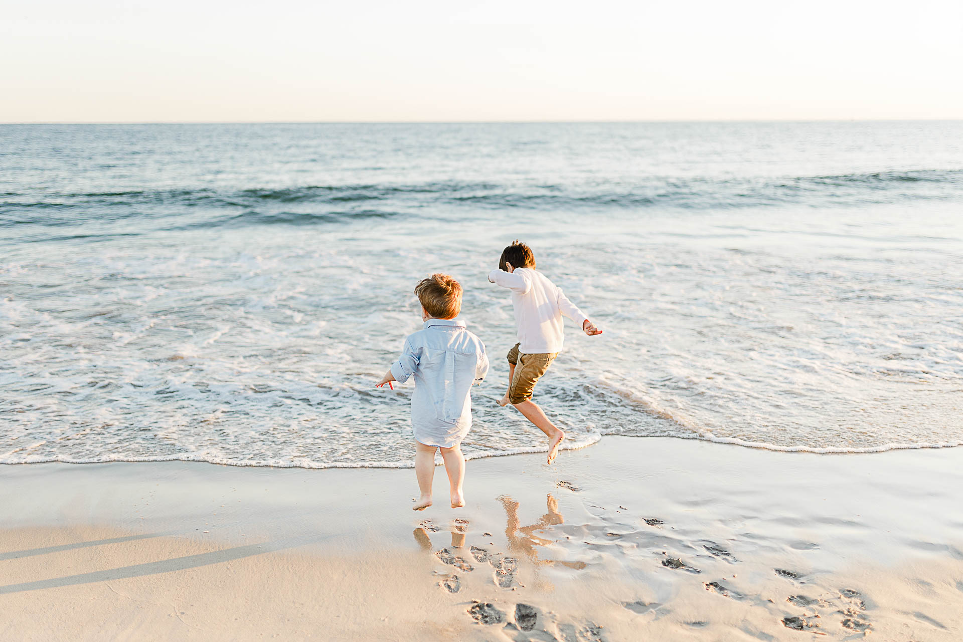 Watch Hill Family Portraits by Christina Runnals Photography | Little boys playing on the beach