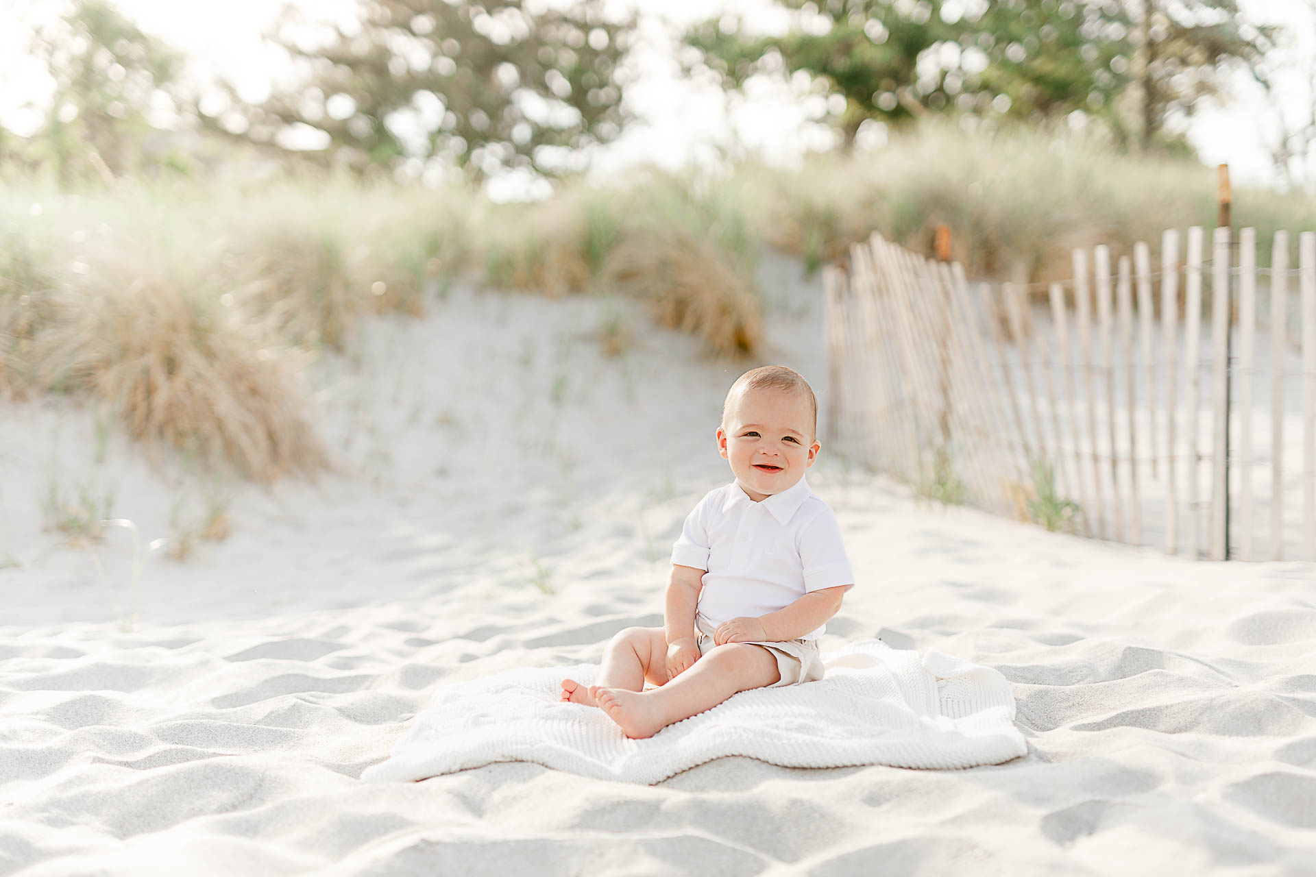 Photos by South Shore Baby Photographer Christina Runnals | Baby sitting on the beach