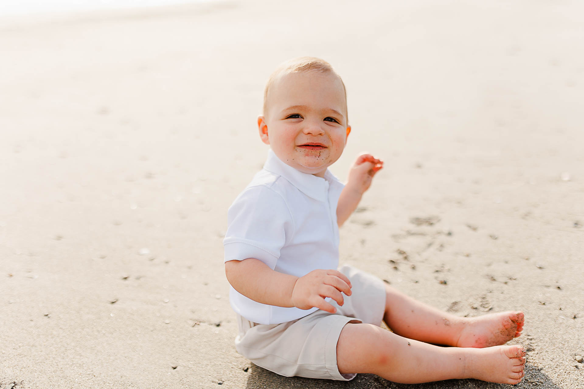 Photo by Scituate Photographer Christina Runnals | Baby sitting on the beach