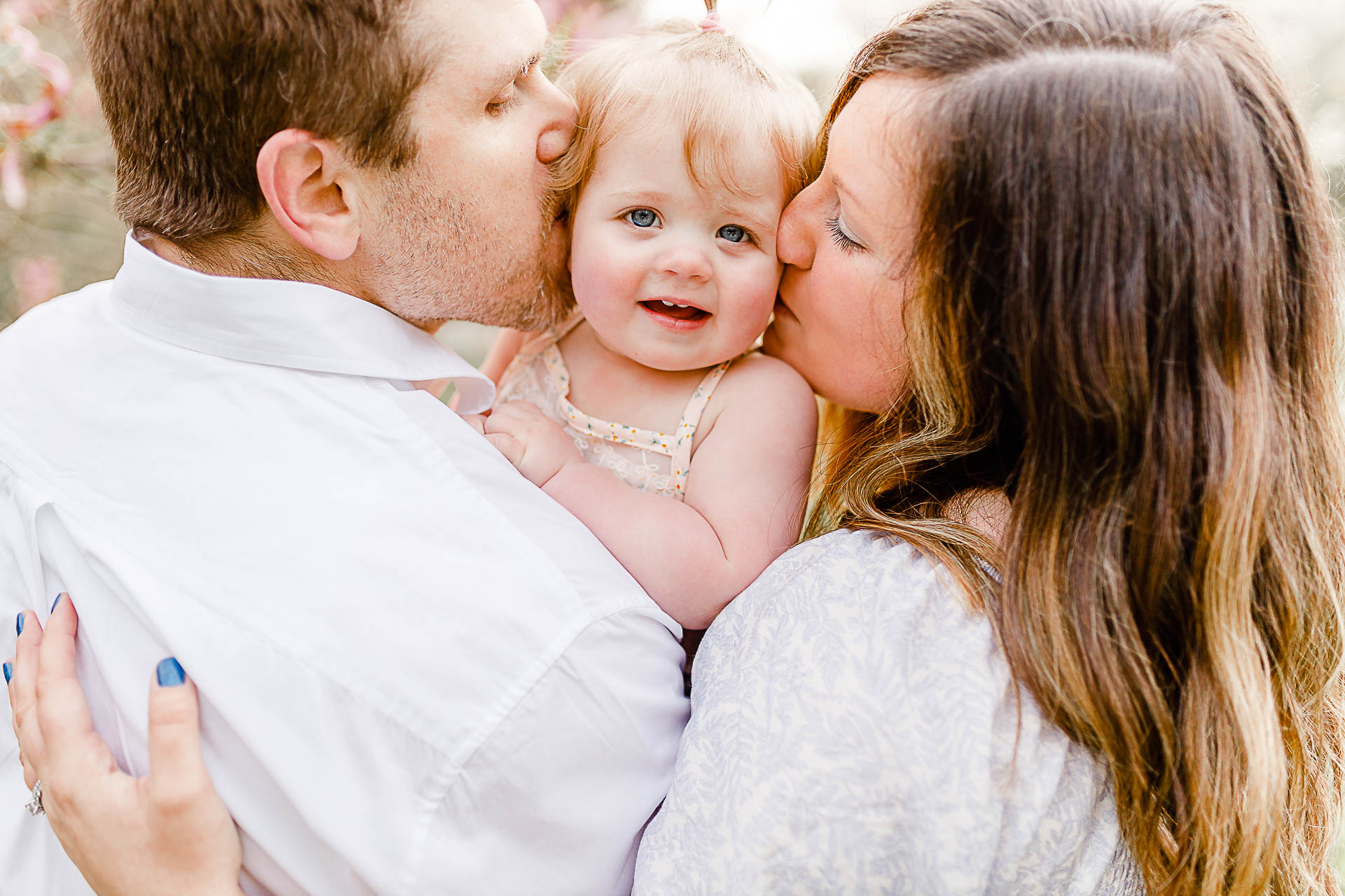 Photo by Kingston Massachusetts Photographer Christina Runnals Photography | Parents holding baby daughter
 