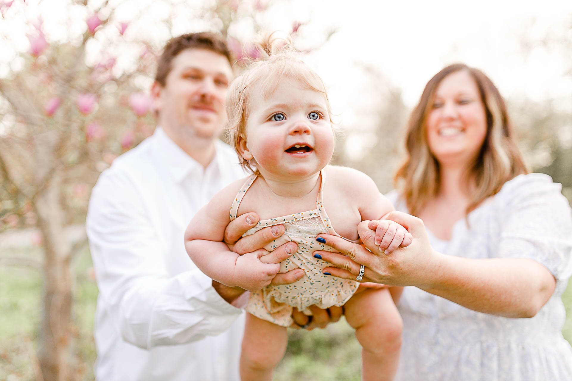 Photo by Kingston Massachusetts Photographer Christina Runnals Photography | Parents holding baby daughter
