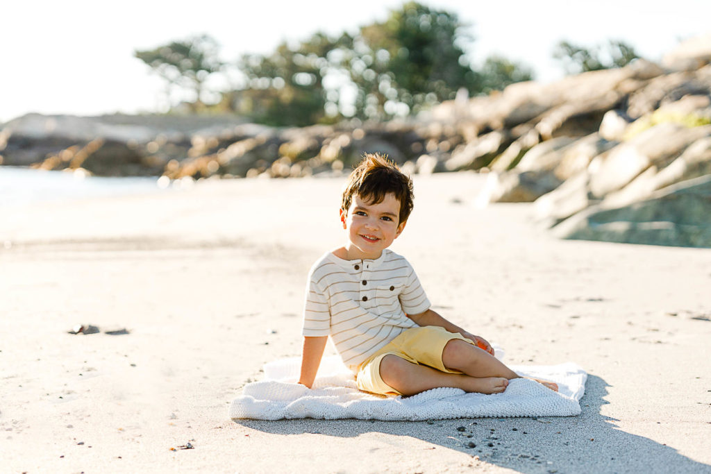 Pictures of little boy on beach by Dorchester photographer Christina Runnals
