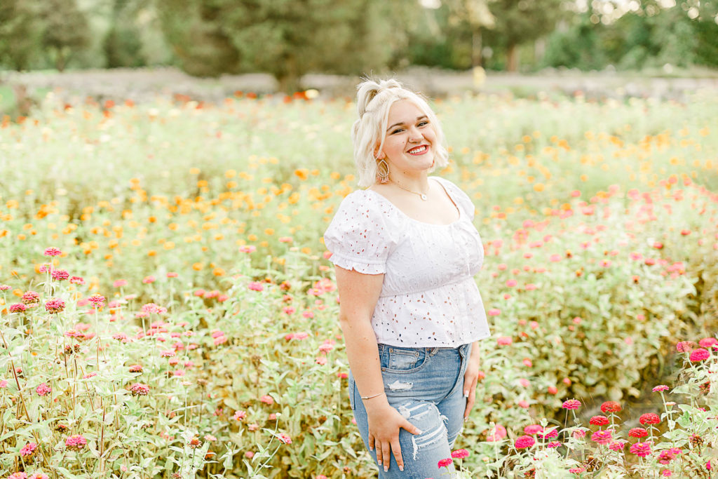Teenage girl's senior pictures with flowers 