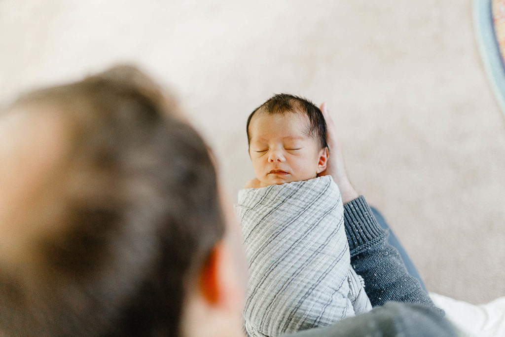 Lifestyle newborn portrait by Plymouth Massachusetts newborn photographer Christina Runnals