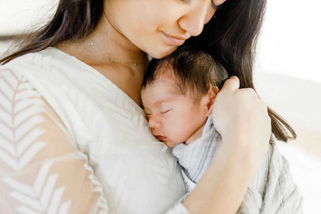 Lifestyle newborn portrait by Plymouth Massachusetts newborn photographer Christina Runnals