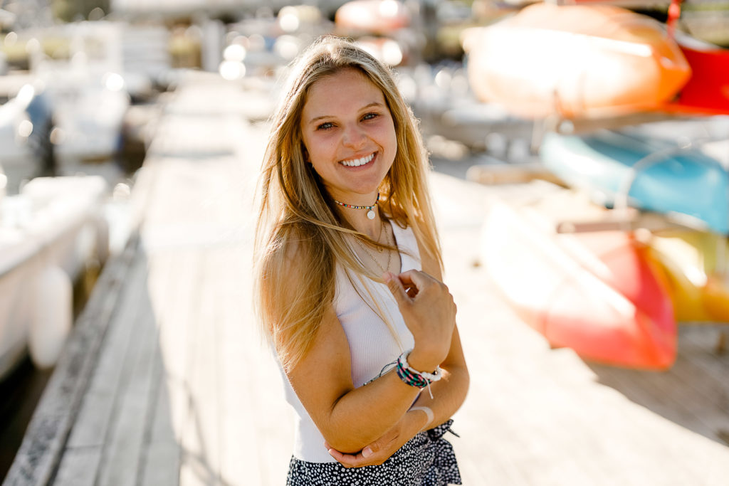 Gabrielle Henry's Cohasset Yacht Club Senior Pictures with Christina Runnals Photography | girl standing on dock