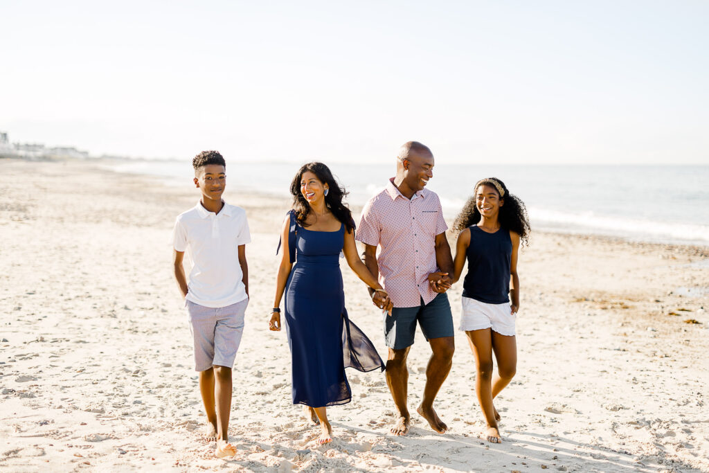 Family portraits by Christina Runnals | Dover Massachusetts Photographer | African American family walking on beach