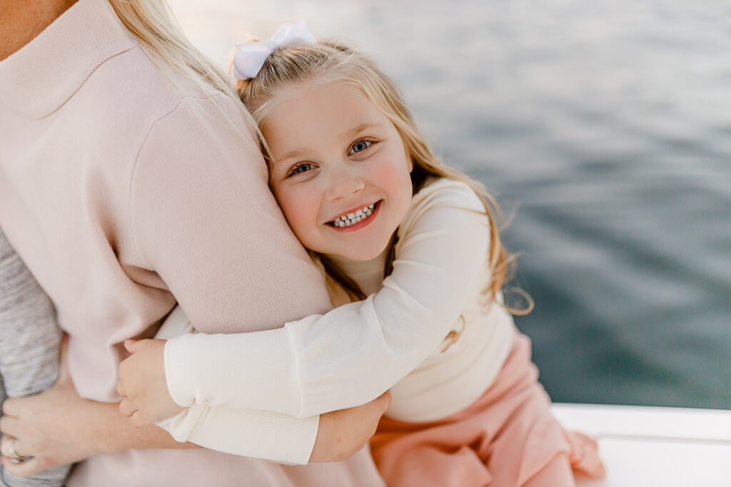 Family pictures on a boat in Scituate Harbor | Images taken by Christina Runnals Photography