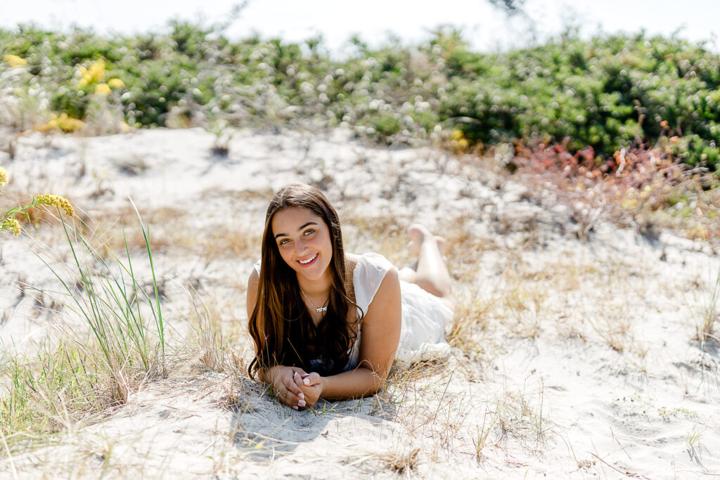 Maddie Reider's Framingham senior pictures taken on a rocky beach of white sands in Massachusetts
