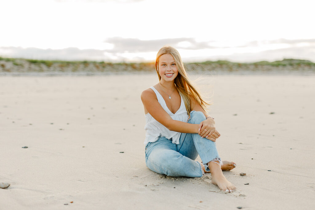 Photo by Massachusetts senior portrait photographer Christina Runnals | High school aged girl having beach senior pictures taken