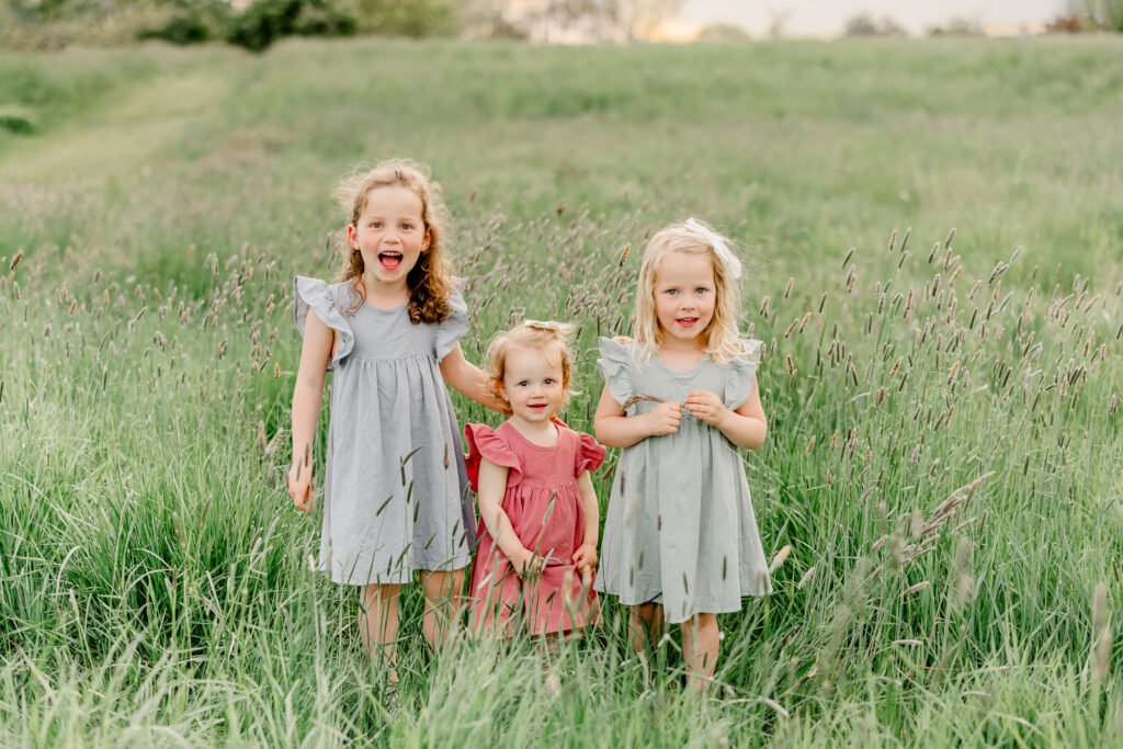 Hingham family photography by Christina Runnals | Spring family photos in a field