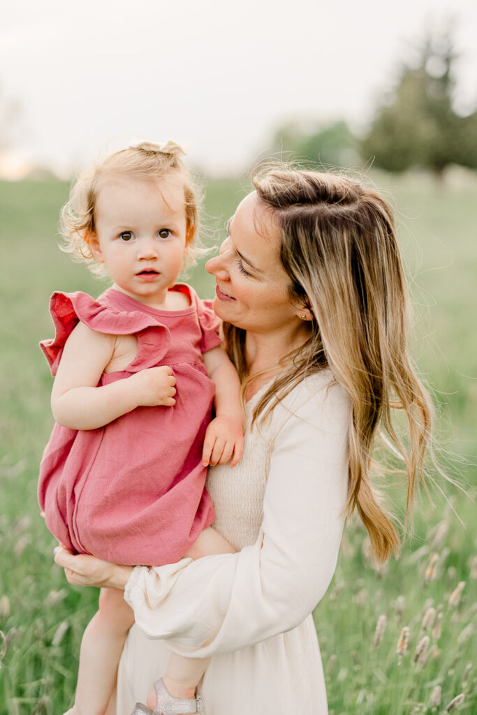 Hingham family photography by Christina Runnals | Spring family photos in a field