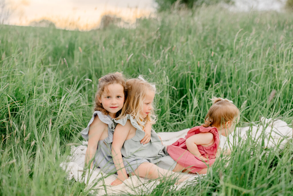 Hingham family photography by Christina Runnals | Spring family photos in a field