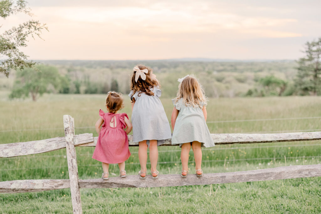 Hingham family photography by Christina Runnals | Spring family photos in a field