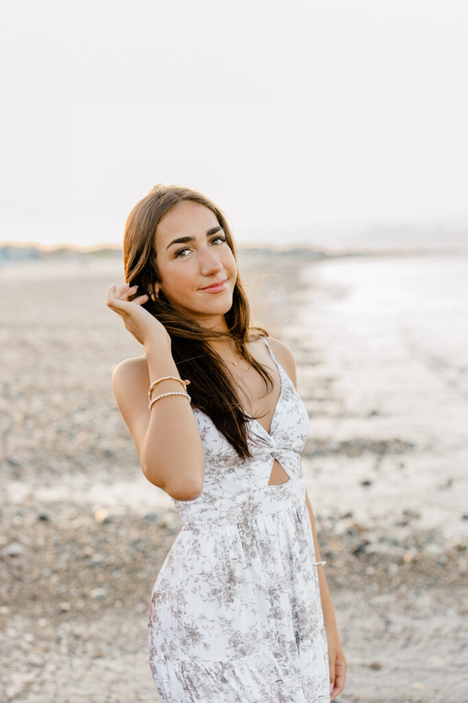 Beach senior portraits South Shore MA with a senior from New Hampshire wearing a long flowy dress
