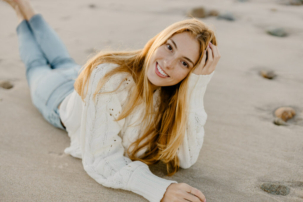 Stella's Boston Latin senior portraits by Christina Runnals Photography taken at the beach | Natural and candid senior photos