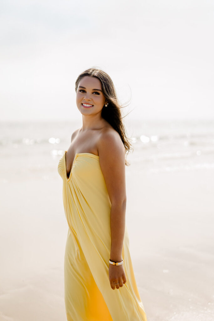 Duxbury Beach senior portraits Massachusetts with a girl in a long butter yellow dress
