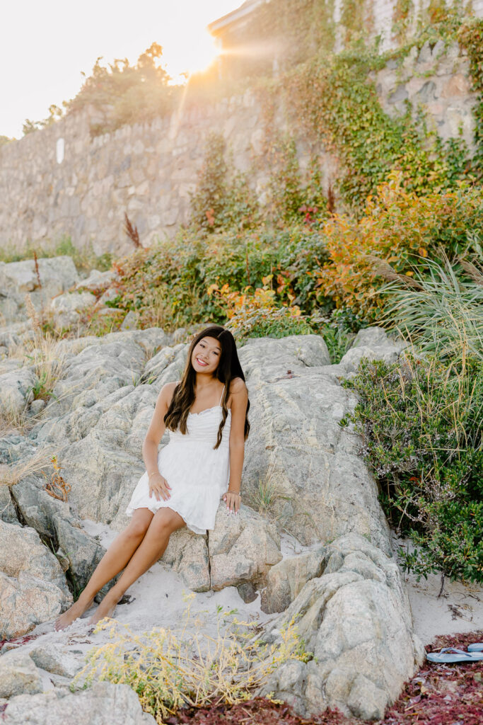 Senior portraits of a girl in a short white sundress by Hopkinton MA senior photographer Christina Runnals