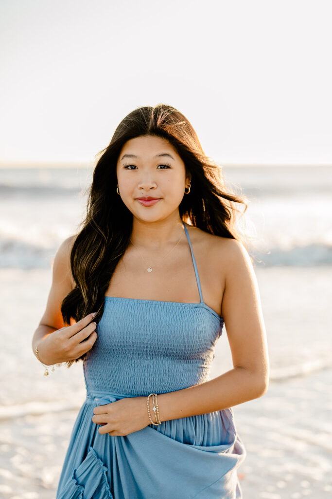 Senior portraits of a girl in a long slate blue dress by Hopkinton MA senior photographer Christina Runnals