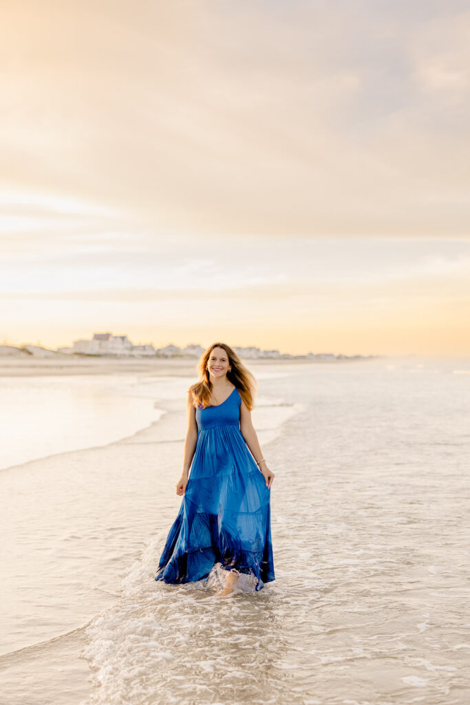 Senior portrait of a girl in a long blue dress by Stow MA senior photographer Christina Runnals